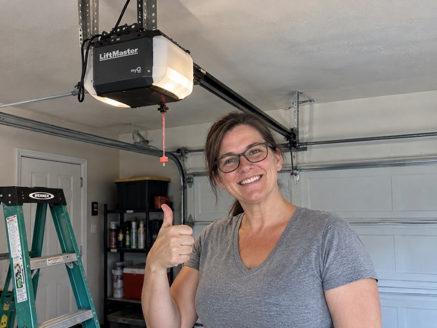 Sarah P. inside a residential garage in Elgin